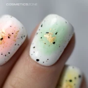 Manicure-hybrydowy.-Paznokcie-pomalowane-lakierem-hybrydowym-hipoalergicznym-w-kolorze-bialym---Intense-White-003 (1).webp