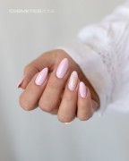 Manicure-hybrydowy.-Paznokcie-pomalowane-lakierem-hybrydowym-w-kolorze--jasny-rozowy.webp
