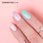 Manicure-wykonany-z-wykorzystaniem-lakieru-hybrydowego-rozowego-z-czarnymi-kropkami.webp